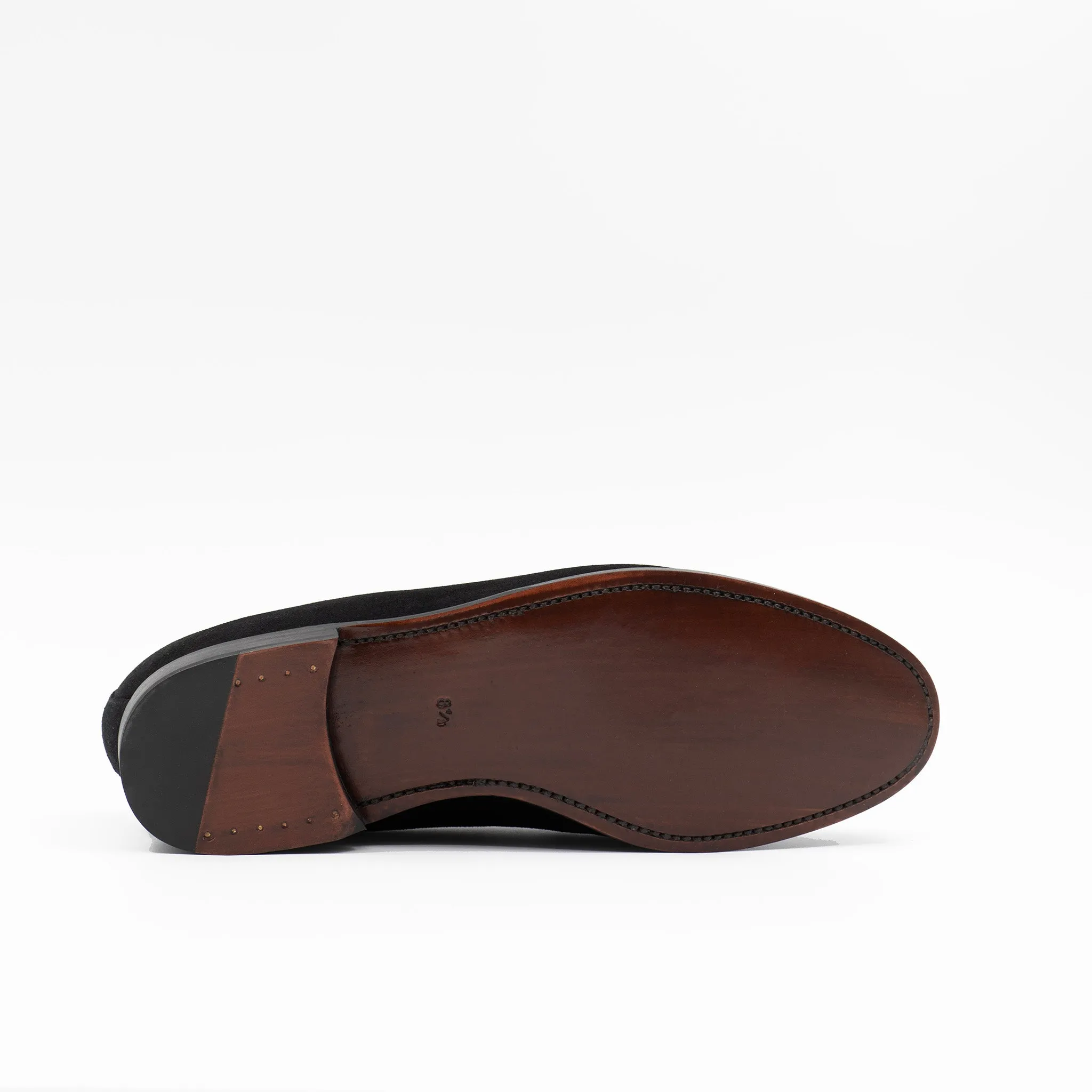 The tassel loafer in black suede